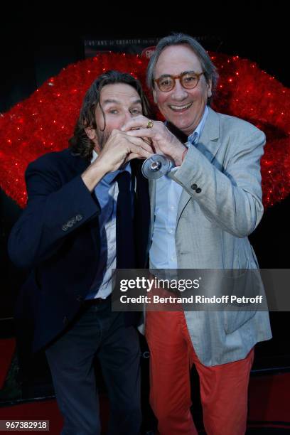 Autor of the preface of the book "Illusions dangereuses", Frederic Beigbeder and singer Philippe Lavil attend the "Illusions Dangereuses" Release...