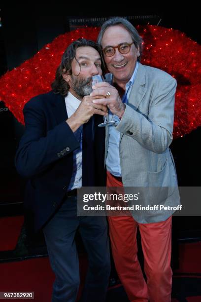 Autor of the preface of the book "Illusions dangereuses", Frederic Beigbeder and singer Philippe Lavil attend the "Illusions Dangereuses" Release...