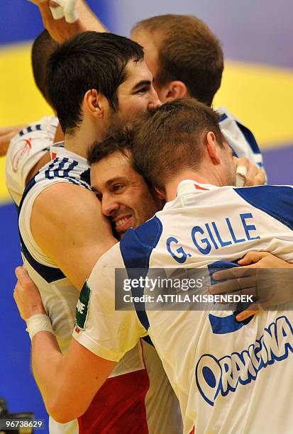 France's Michael Guigou celebrates with teammates on January 30 after winning the EHF EURO 2010 Handball Championship semi-final Iceland vs. France...