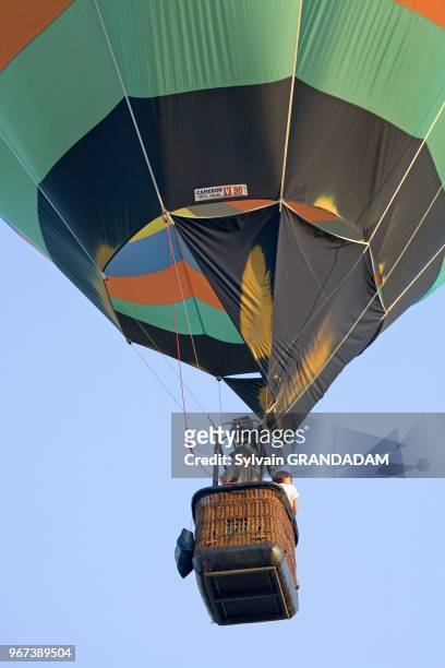 Hot-air balloon taking off. Chambord castle and 5440 ha game national preserve. The castle, largest in Touraine, was built in 1519-1547 by king...