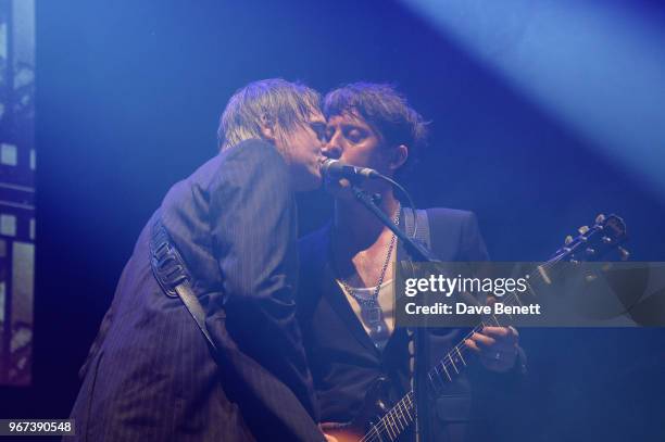 Pete Doherty and Carl Barat of The Libertines attend the "Hoping For Palestine" benefit concert for Palestinian refugee children at The Roundhouse on...