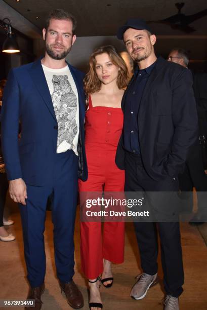 Simon Evans, Sophie Cookson and Orlando Bloom attend the press night after party for "Killer Joe" at Leicester Square Kitchen on June 4, 2018 in...