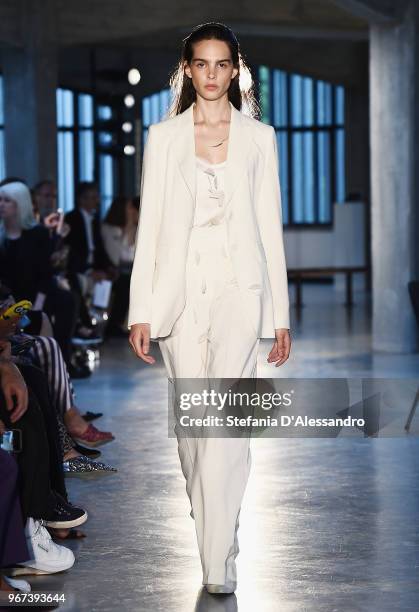 Model walks the runway at the Max Mara Resort Show 2019 at Collezione Maramotti on June 4, 2018 in Reggio nell'Emilia, Italy.