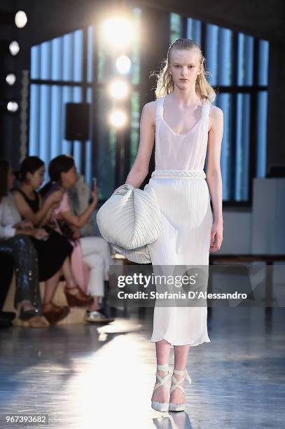 Model walks the runway at the Max Mara Resort Show 2019 at Collezione Maramotti on June 4, 2018 in Reggio nell'Emilia, Italy.