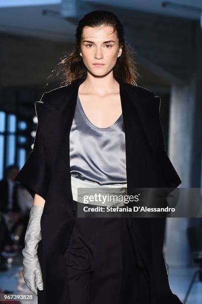 Model walks the runway at the Max Mara Resort Show 2019 at Collezione Maramotti on June 4, 2018 in Reggio nell'Emilia, Italy.