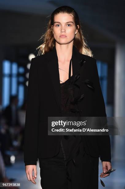 Model walks the runway at the Max Mara Resort Show 2019 at Collezione Maramotti on June 4, 2018 in Reggio nell'Emilia, Italy.