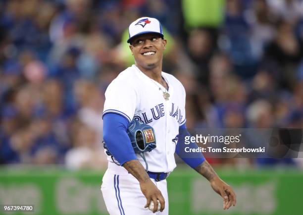 Marcus Stroman of the Toronto Blue Jays smiles in the second inning during MLB game action against the Seattle Mariners at Rogers Centre on May 8,...