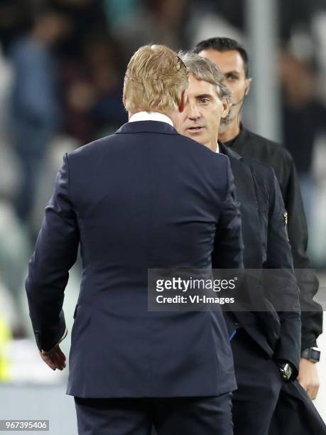 Coach Ronald Koeman of Holland, coach Gian Roberto Mancini of Italy during the International friendly match between Italy and The Netherlands at...