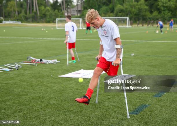 Team England Jamie Tregaskiss warms up Hacky sack style with a tennis ball before the Lone Star Invitational Amputee Soccer tournament on June 2,...