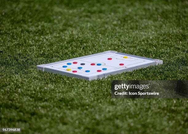 Amputee soccer is a 7 v 7 lineup game. Strategy board lies on the pitch during the Lone Star Invitational Amputee Soccer tournament on June 2, 2018...