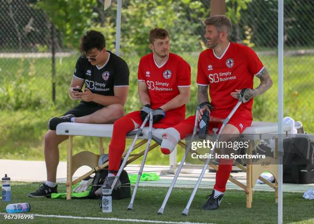 Team England substitute players chat during the Lone Star Invitational Amputee Soccer tournament on June 2, 2018 at Gosling Sports Fields in The...