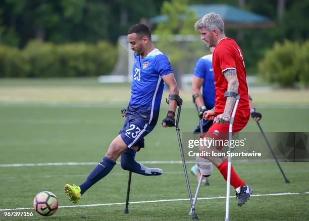 Team USA Jovan Booker gets ahead of Team England Tony Mills during the Lone Star Invitational Amputee Soccer tournament on June 2, 2018 at Gosling...