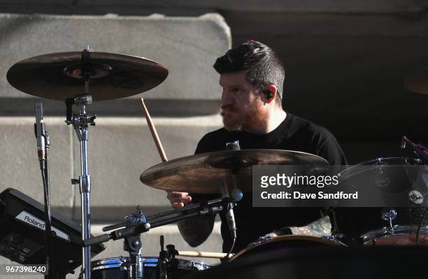 Drummer Andy Hurley of Fall Out Boy performs before Game Four of the 2018 NHL Stanley Cup Final between the Vegas Golden Knights and the Washington...