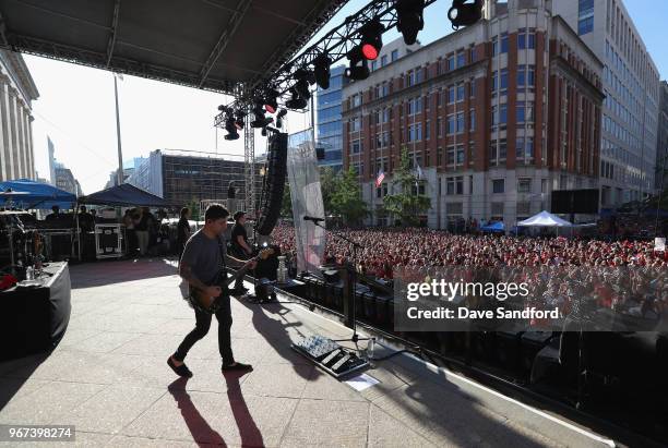 Patrick Stump, Joe Trohman, Andy Hurley and Pete Wentz of Fall Out Boy perform in the pregame concert on the steps of the Smithsonians National...