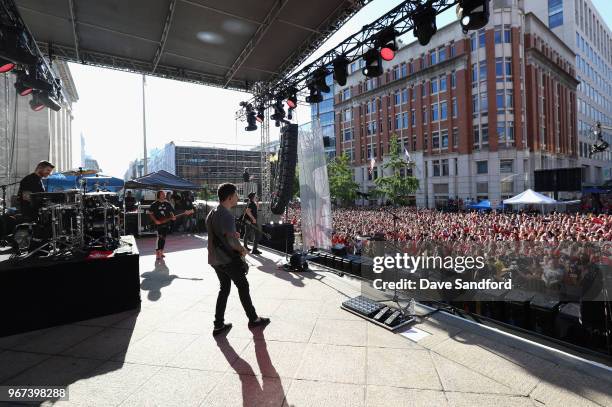 Patrick Stump, Joe Trohman, Andy Hurley and Pete Wentz of Fall Out Boy perform in the pregame concert on the steps of the Smithsonians National...