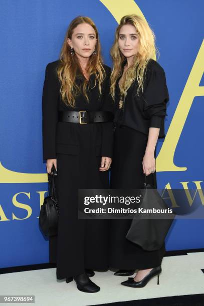 Mary-Kate Olsen and Ashley Olsen attend the 2018 CFDA Fashion Awards at Brooklyn Museum on June 4, 2018 in New York City.