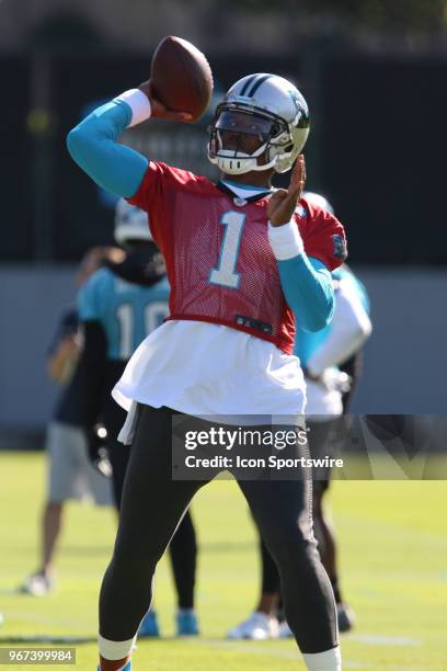 Cam Newton throws a pass during the Carolina Panthers OTA at the Carolina Panthers Training Facility on June 04, 2018 in Charlotte, NC.