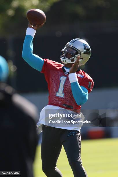 Cam Newton throws a pass during the Carolina Panthers OTA at the Carolina Panthers Training Facility on June 04, 2018 in Charlotte, NC.