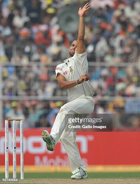 Duminy of South Africa bowls during the day three of the Second Test match between India and South Africa at Eden Gardens on February 16, 2010 in...