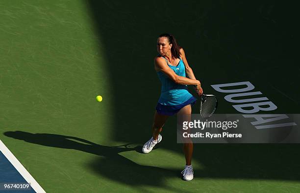 Jelena Jankovic of Serbia hits a backhand during her second round match against Aravane Rezai of France during day three of the WTA Barclays Dubai...