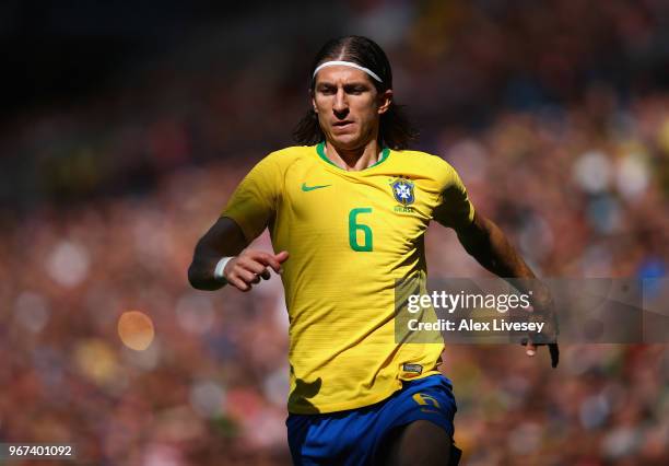 Filipe Luis of Brazil chases the ball during the International friendly match between of Croatia and Brazil at Anfield on June 3, 2018 in Liverpool,...