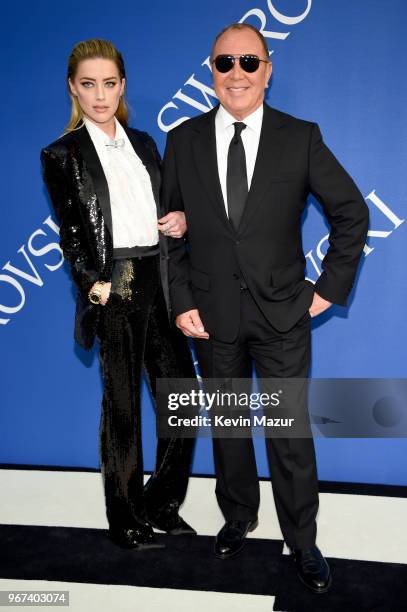 Amber Heard and Michael Kors attend the 2018 CFDA Fashion Awards at Brooklyn Museum on June 4, 2018 in New York City.