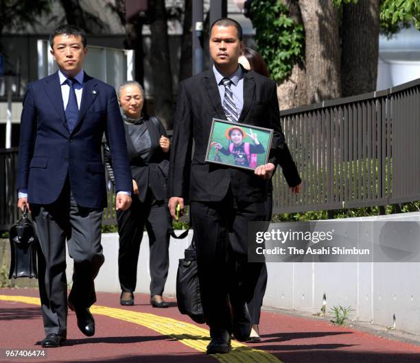 Le Anh Hao heads to the Chiba District Court for the opening day of the trial over the slaying of his daughter, Le Thi Nhat Linh on June 4, 2018 in...