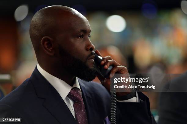 Tony Gwynn Jr. Talks on the phone during the 2018 Major League Baseball Draft at Studio 42 at the MLB Network on Monday, June 4, 2018 in Secaucus,...