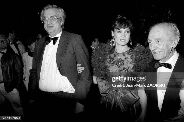 Le realisateur Bertrand Tavernier en compagnie de Sabine Azema et Louis Ducreux, pour son film "un dimanche à la campagne" lors du 37eme festival...