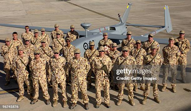 This handout file photo provided by the Israel Aerospace Industries shows the Royal Australian Air Force personnel around their IAI-made Heron, a...