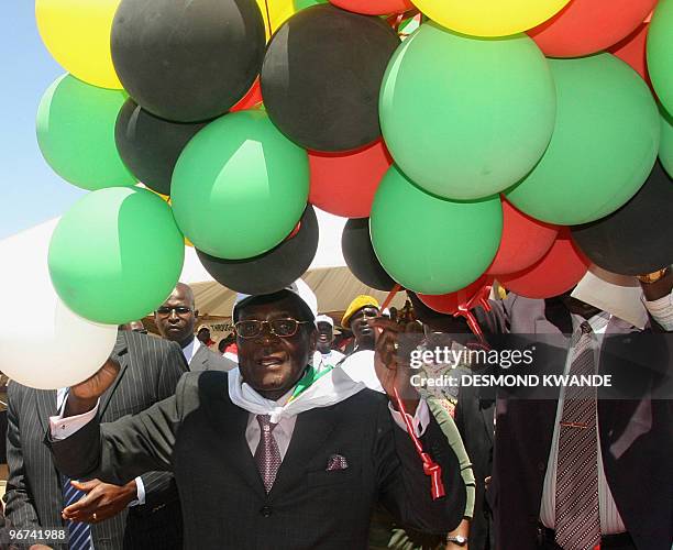 Zimbabwean President Robert Mugabe and supporters celebrate during his birthday held in Beitbridge on February 23, 2008.President Mugabe turned 84...
