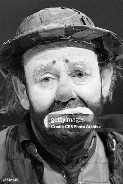 Close-up of American circus performer Emmett Kelly , in costume and make-up as his famous clown character 'Weary Willy, on an episode of the...