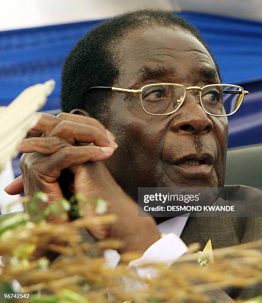 Zimbabwean President Robert Mugabe addresses, 08 October 2007, guests at a function in the capital Harare where he commissioned farming equipment to...