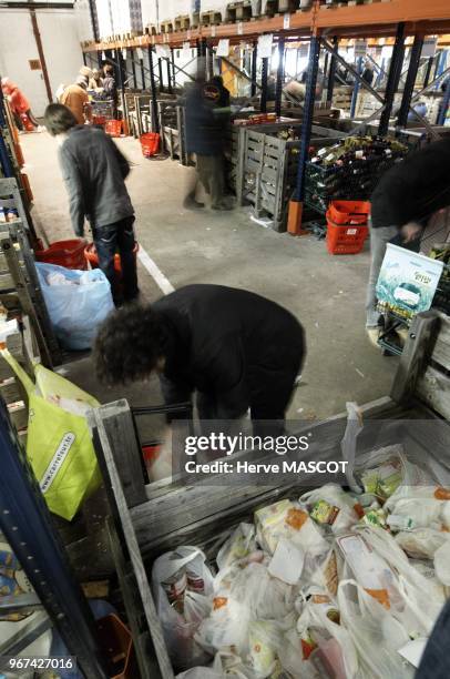 People are classifying food from differents places and choose them to be delivered to needy on December 21, 2010 in Bordeaux, France.