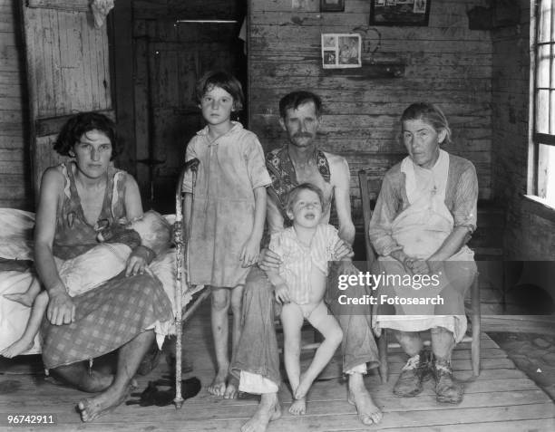 Sharecropper's family photographed during the Great Depression by Walker Evans at Hale County, Alabama, USA, circa 1936. .