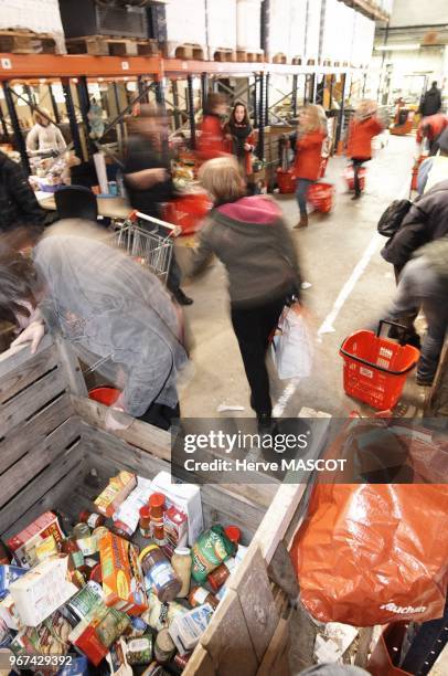 People are classifying food from differents places and choose them to be delivered to needy on December 21, 2010 in Bordeaux, France.