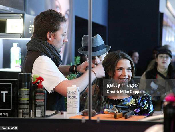 Model and television personality Erin Lucas is seen getting her hair done at the TRESemme booth at Bryant Park during Mercedes-Benz Fashion Week Fall...