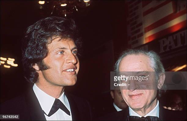 File photo dated in April 1971 shows American film director Jules Dassin and of his son singer Joe Dassin at the Olympia concert hall in Paris during...