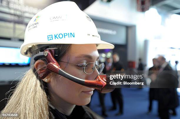 Visitor tests the new Motorola Golden-I device at the Mobile World Congress in Barcelona, Spain, on Tuesday, Feb. 16, 2010. Leading mobile executives...