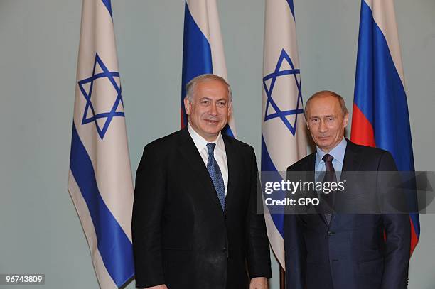 In this handout photo provided by the Israeli Government Press Office , Israeli Prime Minister Benjamin Netanyahu meets with Russian Prime Minister...