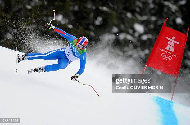 France's David Poisson takes a curve during the Men's Vancouver 2010 Winter Olympics Downhill event at Whistler Creek side Alpine skiing venue on...