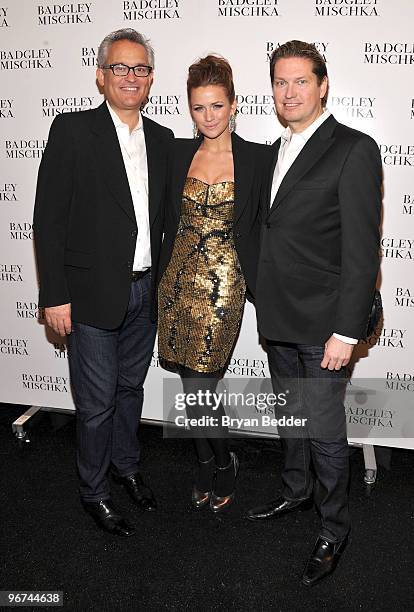 Designer Mark Badgley, actress Shantel VanSanten and designer James Mishka pose backstage at the Badgley Mischka Fall 2010 Fashion Show during...