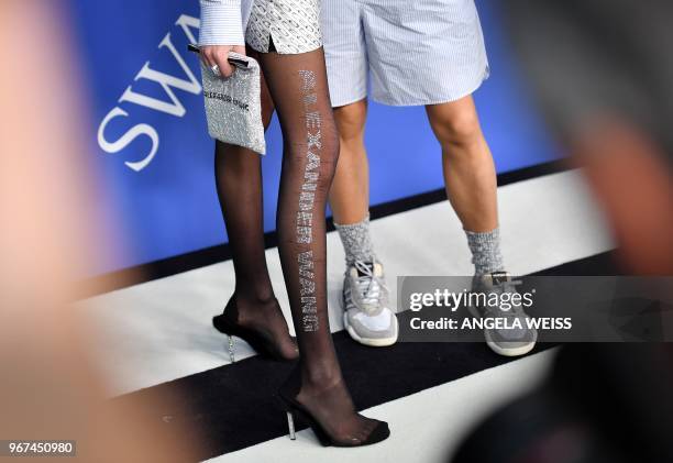 Us model Kaia Gerber and US fashiopn designer Alexander Wang arrive at the 2018 CFDA Fashion awards June 4, 2018 at The Brooklyn Museum in New York.