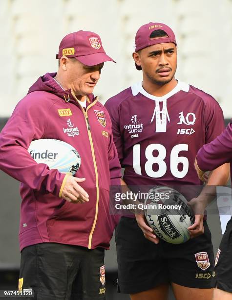 Kevin Walters the caoch and Anthony Milford of the Maroons chat during a Queensland Maroons Captain's Run at the Melbourne Cricket Ground on June 5,...