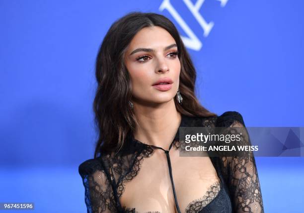 Model/actress Emily Ratajkowski arrives at the 2018 CFDA Fashion awards June 4, 2018 at The Brooklyn Museum in New York.