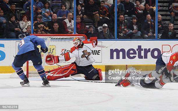 Tomas Vokoun of the Florida Panthers makes a save against Evander Kane of the Atlanta Thrashers at Philips Arena on February 6, 2010 in Atlanta,...