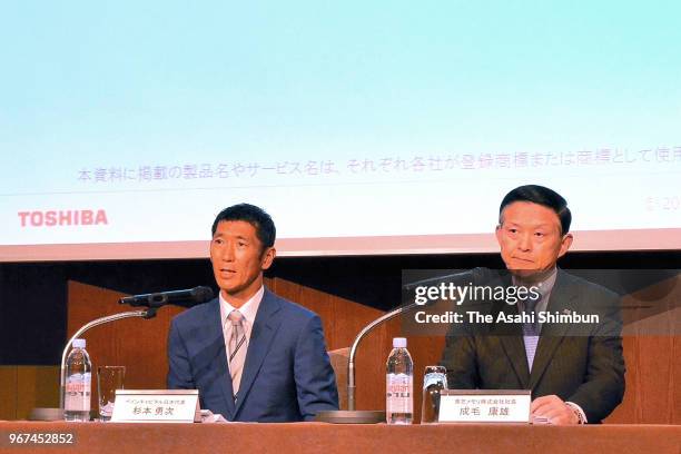 Toshiba Memory President Yasuo Naruke and Bain Capital Japan chief Yuji Sugimoto attend a press conference on June 4, 2018 in Tokyo, Japan.