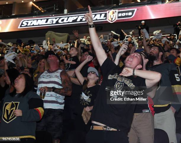 Vegas Golden Knights fans including Brandon Varela of Nevada cheer during a Golden Knights road game watch party for Game Four of the 2018 NHL...