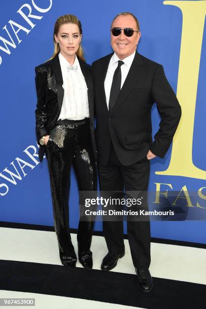 Amber Heard and Michael Kors attend the 2018 CFDA Fashion Awards at Brooklyn Museum on June 4, 2018 in New York City.