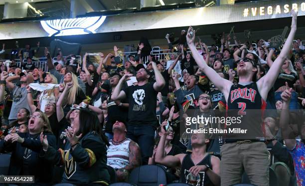 Vegas Golden Knights fans react during a Golden Knights road game watch party for Game Four of the 2018 NHL Stanley Cup Final between the Golden...